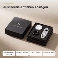 Lieferumfang in der HUMANCORE Box: Smart Ring, kabellose Ladestation, USB-C-Kabel